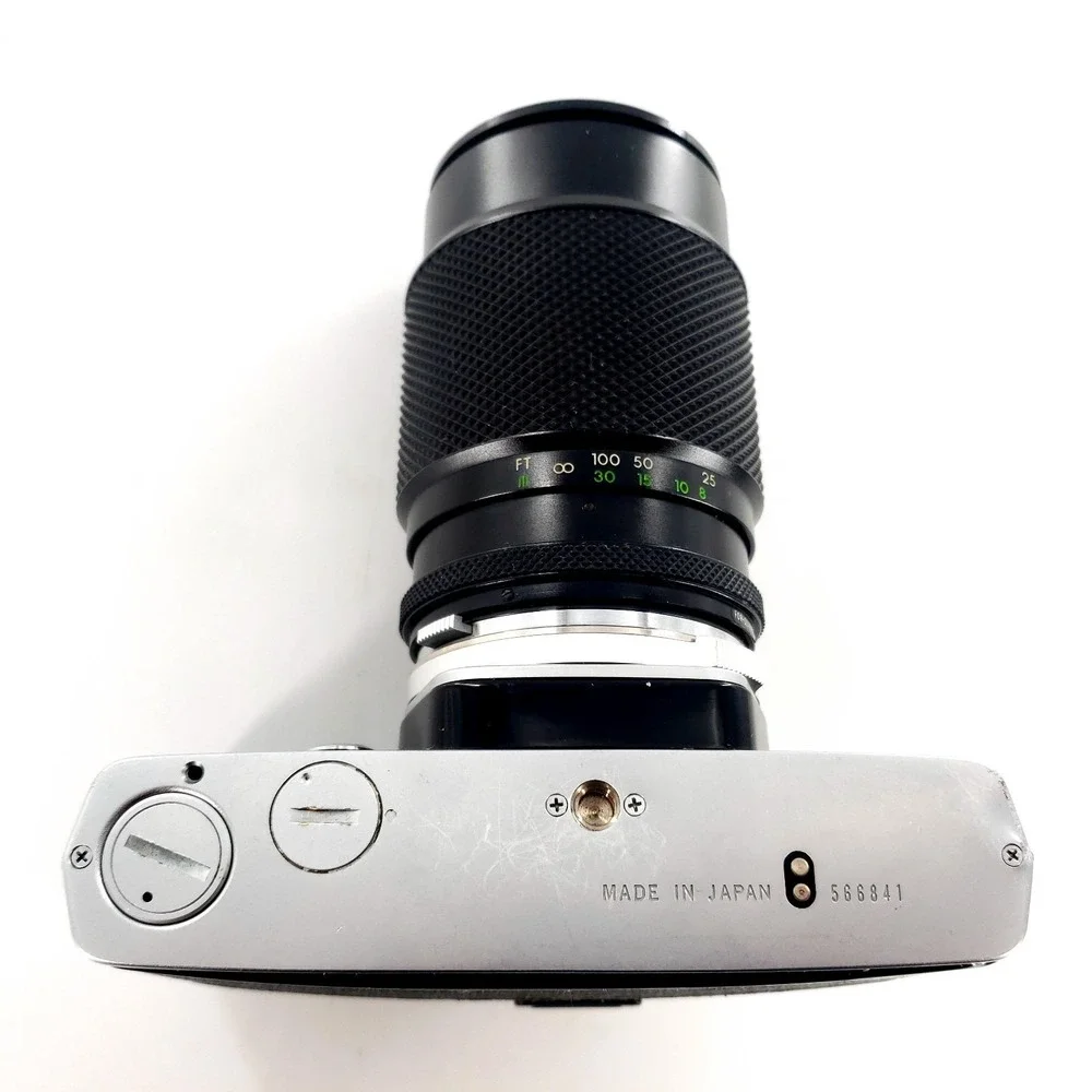 Olympus OM 1 35mm SLR Film Camera with 75-150mm Lens w/ Quantaray 135mm f/2.8